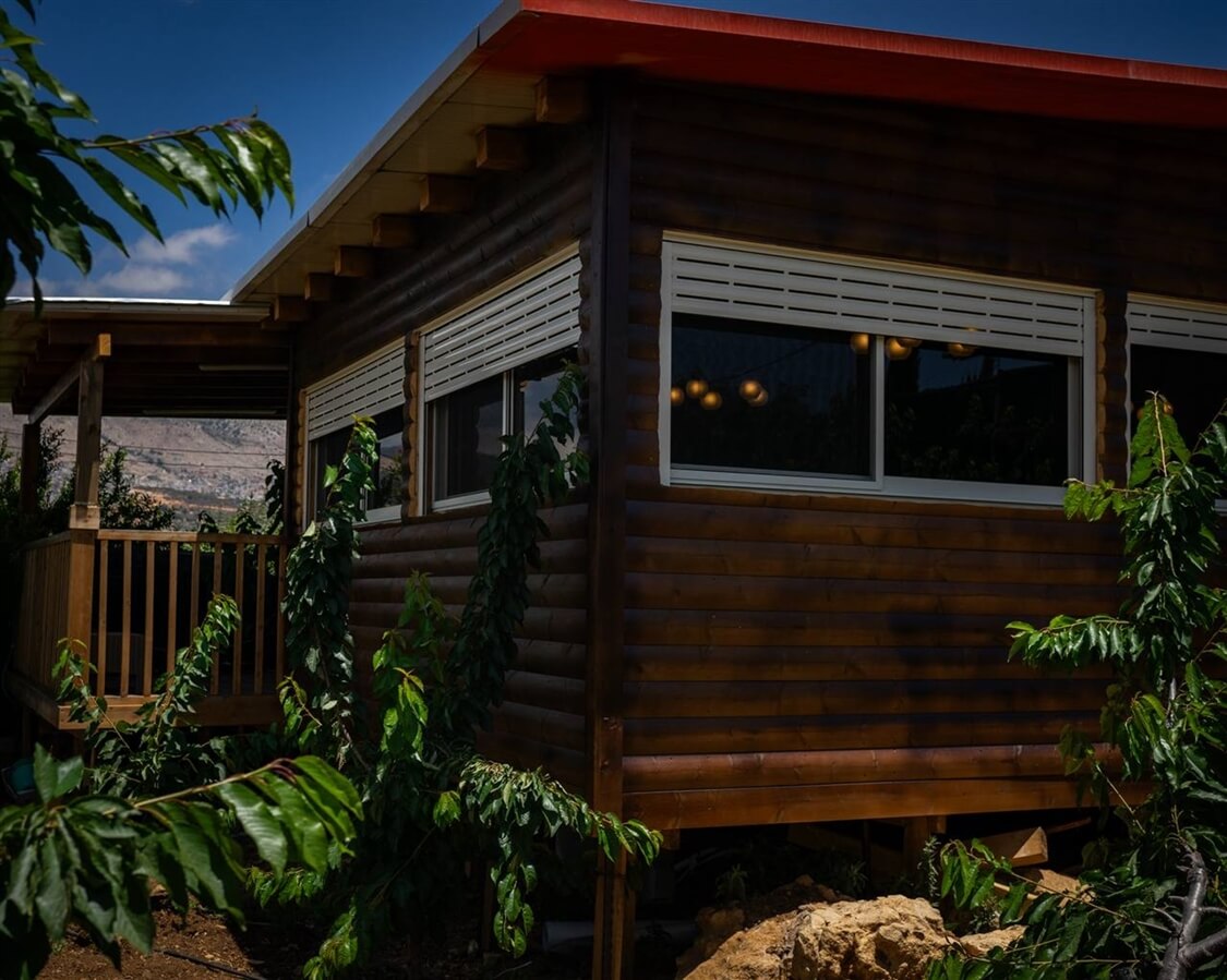 תמונה של בקתות עץ בטבע - 4