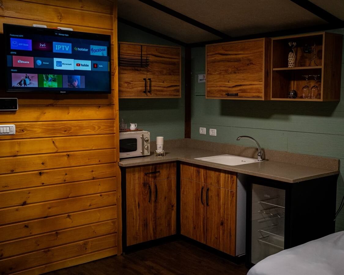 תמונה של בקתות עץ בטבע - 8