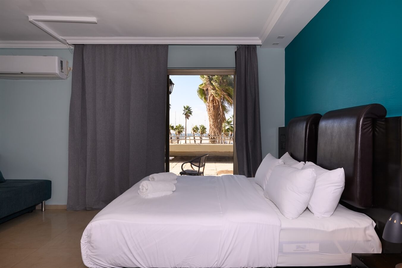 תמונה של חדר משפחה עם נוף לים - 8